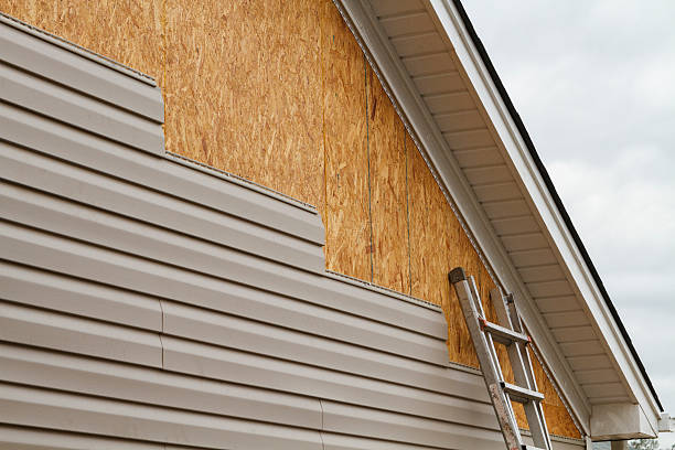 Professional Wood Siding technician working in Potomac, MD